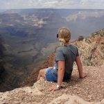 girl-sitting-grand-canyon