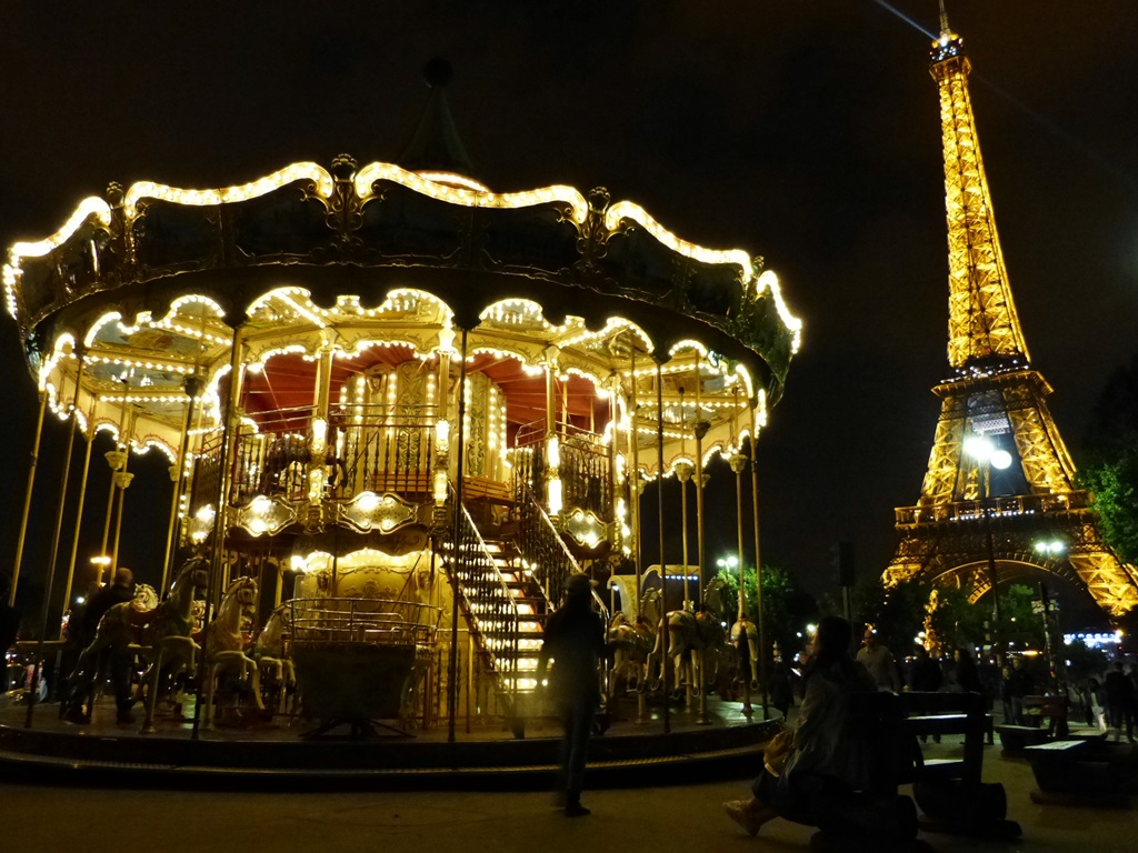 moments of travel at the Eiffel Tower at night in Paris