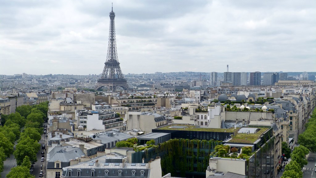 moments of travel on top of the Arc de Triomphe in Paris