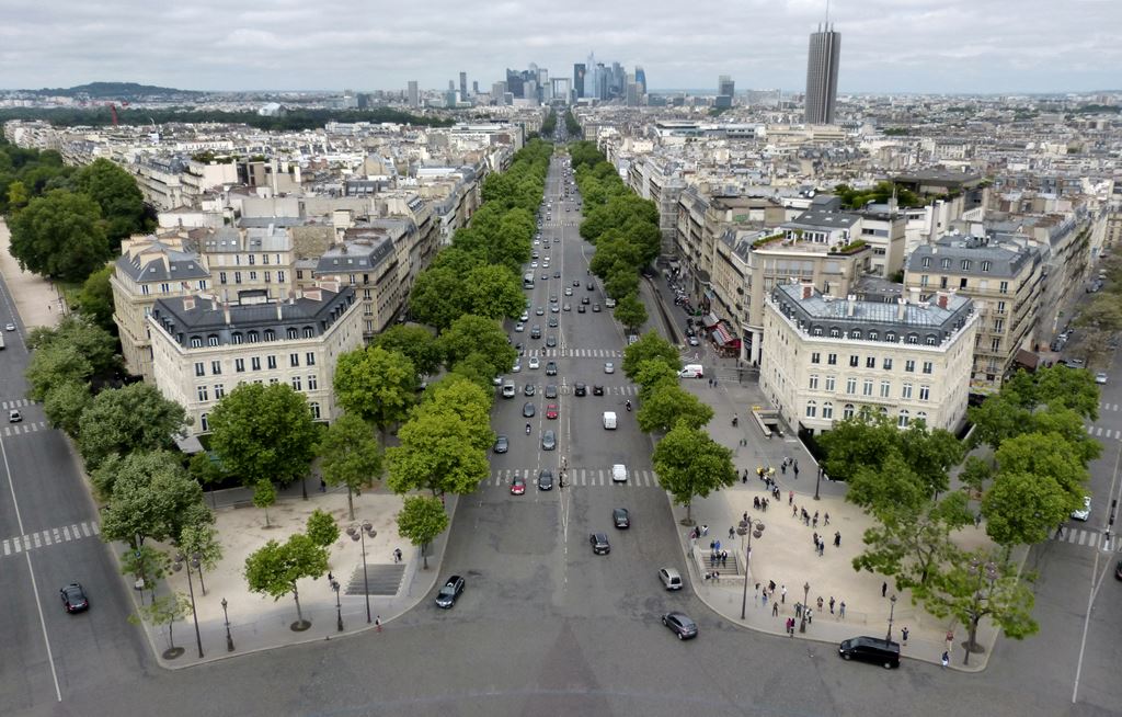 moments of travel on top of the Arc de Triomphe in Paris 