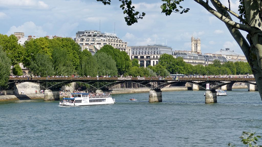 moments of travel walking along the Seine in Paris