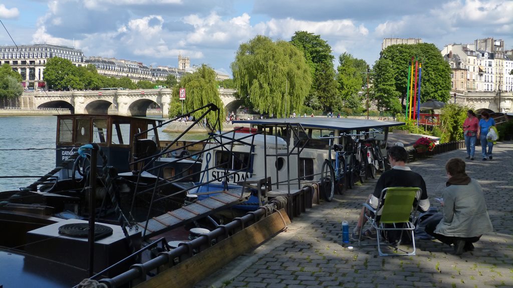 moments of travel walking along the Seine in Paris