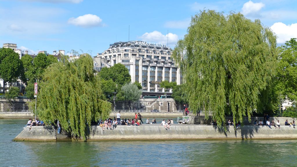 moments of travel walking along the Seine to Notre Dame in Paris