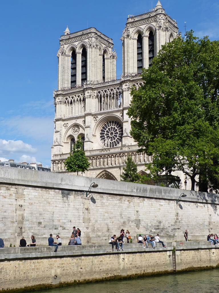 moments of travel walking along the Seine to Notre Dame in Paris