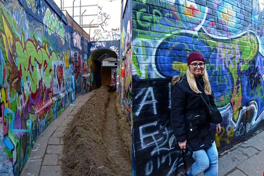 Mädchen steht an Wand in der Grafitti Street, Gent Sehenswürdigkeiten, Moments of Travel