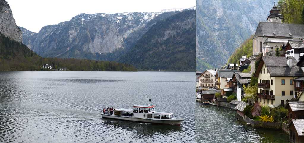 Boot fährt auf Hallstätter See vor Hauskulisse